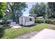 Spacious backyard with storage shed and ample green space, perfect for outdoor activities at 2334 W Doris St, Kissimmee, FL 34741