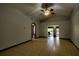 Spacious living room features open concept, great lighting, and neutral walls at 2334 W Doris St, Kissimmee, FL 34741