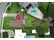 Bird's eye view of a home highlighting the spacious yard, private pool, and boat dock access at 2417 Bayfront Pkwy, Orlando, FL 32806