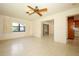 Spacious living room featuring speckled floors and tons of natural light at 2417 Bayfront Pkwy, Orlando, FL 32806