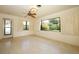 Large living area filled with natural light from a large window overlooking a lush backyard at 2417 Bayfront Pkwy, Orlando, FL 32806