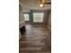Bright living room with wood floors and fireplace at 2558 Robert Trent Jones Dr # 1435, Orlando, FL 32835