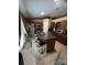 Well-appointed kitchen showcasing a large island with seating and stainless steel appliances at 2830 Gramercy Dr, Deltona, FL 32738