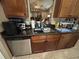 Kitchen view showcasing updated cabinetry, granite countertops, and stainless steel appliances at 2830 Gramercy Dr, Deltona, FL 32738