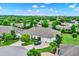 Aerial view of a landscaped home in a residential neighborhood at 3210 Sonesta Ct # B, Clermont, FL 34711