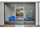 Screened lanai with furniture, providing a relaxing outdoor space at 3210 Sonesta Ct # B, Clermont, FL 34711