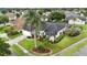 Beautiful home with a well-manicured lawn, mature landscaping, and a screened-in pool at 3808 Ocita Dr, Orlando, FL 32837