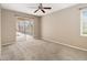 A bedroom provides access to a screened-in porch and patio with a pool at 3808 Ocita Dr, Orlando, FL 32837