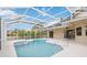 Covered pool and hot tub, which connect to the house with sliding glass doors at 3808 Ocita Dr, Orlando, FL 32837