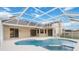 Screened-in outdoor pool and patio area with glass doors to the interior at 3808 Ocita Dr, Orlando, FL 32837