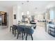 Open concept kitchen featuring granite countertops and an island at 4545 Fox St, Orlando, FL 32814