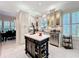 Bright kitchen features white cabinets, stainless appliances, and a stylish island at 4545 Fox St, Orlando, FL 32814