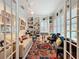 Comfortable living room with custom built-in shelving, natural light and cozy furnishings at 4545 Fox St, Orlando, FL 32814