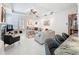 Bright living room features large windows, fireplace, and modern furnishings at 4545 Fox St, Orlando, FL 32814