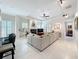 Stylish living room includes a fireplace, large windows, and comfortable seating at 4545 Fox St, Orlando, FL 32814