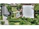 An aerial view of a backyard with a patio set and well-maintained landscaping at 501 Richmond St, Orlando, FL 32806