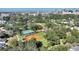 Aerial view featuring baseball fields, tennis courts, and city skyline in the distance at 501 Richmond St, Orlando, FL 32806