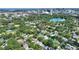 Aerial shot showcasing the property's location near downtown and lakes, nestled in a neighborhood with lush trees at 501 Richmond St, Orlando, FL 32806