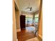 Bright bedroom featuring hardwood floors, natural light, and a wardrobe at 501 Richmond St, Orlando, FL 32806