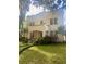 Stunning two-story home with a charming front porch and well-manicured lawn at 501 Richmond St, Orlando, FL 32806