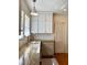 Bright kitchen with white cabinets, granite countertops, and stainless steel appliances at 501 Richmond St, Orlando, FL 32806