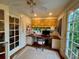 Bright home office with built-in desk, custom window treatment, and lots of natural light at 501 Richmond St, Orlando, FL 32806