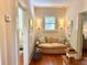 Inviting sitting area with comfortable couch and natural light at 501 Richmond St, Orlando, FL 32806