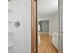 A partial view from the shower looking into the bedroom, featuring a vanity and hardwood floors at 5334 Cypress Dr, Winter Park, FL 32792