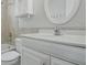 Clean bathroom with white vanity, toilet, and tub/shower combination, offering a functional and tidy space at 5334 Cypress Dr, Winter Park, FL 32792