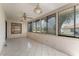 Well-lit sunroom with tile floor and multiple windows offering great views at 5439 E Sacramento Ct, Orlando, FL 32821