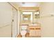 Bathroom featuring standing shower and a single sink vanity at 5588 Garden Grove Cir, Winter Park, FL 32792