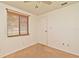Bedroom with neutral carpet, ceiling fan, window with blinds, and white door and trim at 5588 Garden Grove Cir, Winter Park, FL 32792