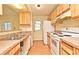Functional kitchen with laminate countertops and white appliances at 5588 Garden Grove Cir, Winter Park, FL 32792