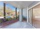 Enclosed patio featuring beautiful landscaping, trees, and a lovely view at 711 Sugar Bay Way # 109, Lake Mary, FL 32746