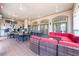 Outdoor lounge area offers multiple seating areas with adjacent access to bar and dining at 8020 Tuscany Way # 6301, Davenport, FL 33896