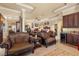 Spacious bedroom boasts sitting area, wine bar, and tray ceilings at 9400 Laws Road, Clermont, FL 34714