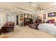 Expansive bedroom with tray ceilings and lots of natural light at 9400 Laws Road, Clermont, FL 34714