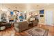 Cozy living room features hardwood floors, built-in shelving, fireplace and neutral paint at 9400 Laws Road, Clermont, FL 34714