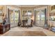 Bright office space with french doors, neutral decor, and ample natural light at 9400 Laws Road, Clermont, FL 34714