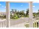 Scenic view from the balcony, showcasing the charming neighborhood and lush greenery at 995 Grand Wildmere, Longwood, FL 32750