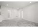 Spacious bedroom featuring neutral colors and plush gray carpeting throughout at 995 Grand Wildmere, Longwood, FL 32750
