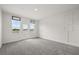 Minimalist bedroom with balcony access and waterfront views at 995 Grand Wildmere, Longwood, FL 32750