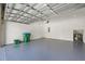 Spacious two car garage with ample storage and epoxy floors at 995 Grand Wildmere, Longwood, FL 32750