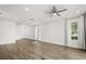 Spacious room with hardwood floors, neutral colors, and ample natural light at 995 Grand Wildmere, Longwood, FL 32750