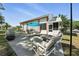 Relaxing backyard with multiple seating areas, a patio, and a grill at 1752 Challenger Ave, Davenport, FL 33897