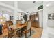 Cozy dining room with hardwood floors, classic decor, and plenty of natural light at 1752 Challenger Ave, Davenport, FL 33897