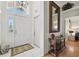 Elegant foyer with tile floors, a chandelier, and a view of the bedroom at 1752 Challenger Ave, Davenport, FL 33897