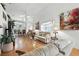 Comfortable living room with hardwood floors, neutral tones, and plenty of seating at 1752 Challenger Ave, Davenport, FL 33897