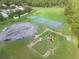 A playground and sports courts offer plenty of recreational opportunities to residents and encourage healthy activity at 10675 Fairhaven Way, Orlando, FL 32825