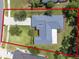 Aerial view of the property, showcasing the landscaping and overall layout at 10675 Fairhaven Way, Orlando, FL 32825